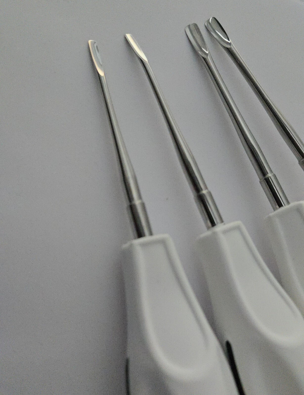 White Plastic Handle Dental Luxating Root Tip Extraction Elevator Loosen Tools