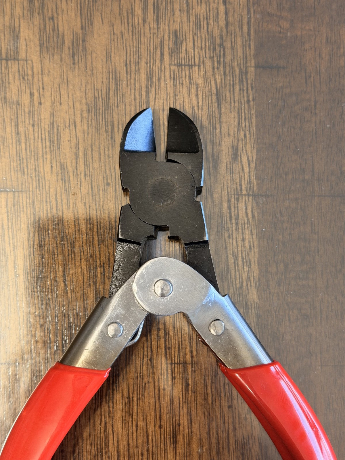 #068 -Orthodental Heavy Duty Wire Cutter with Red Grip capable of cutting .050mm